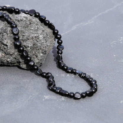 An obsidian necklace
